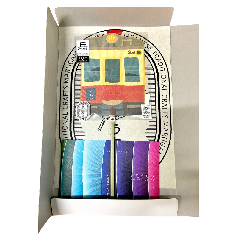 Marugame Uchiwa Fan: SANUKIMONO UCHIWA (Kotoden Train) A Collaboration of Traditional Craftsmanship & Modern Design